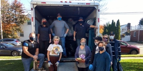 Partner James Burdi Volunteers in Clothing Drive